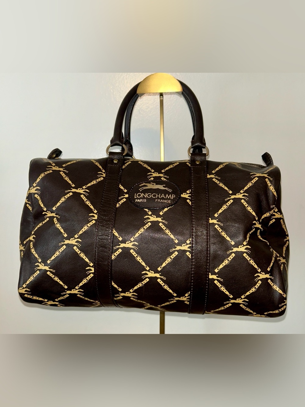 Longchamp Brown Vintage Monogram Leather Boston Bag.